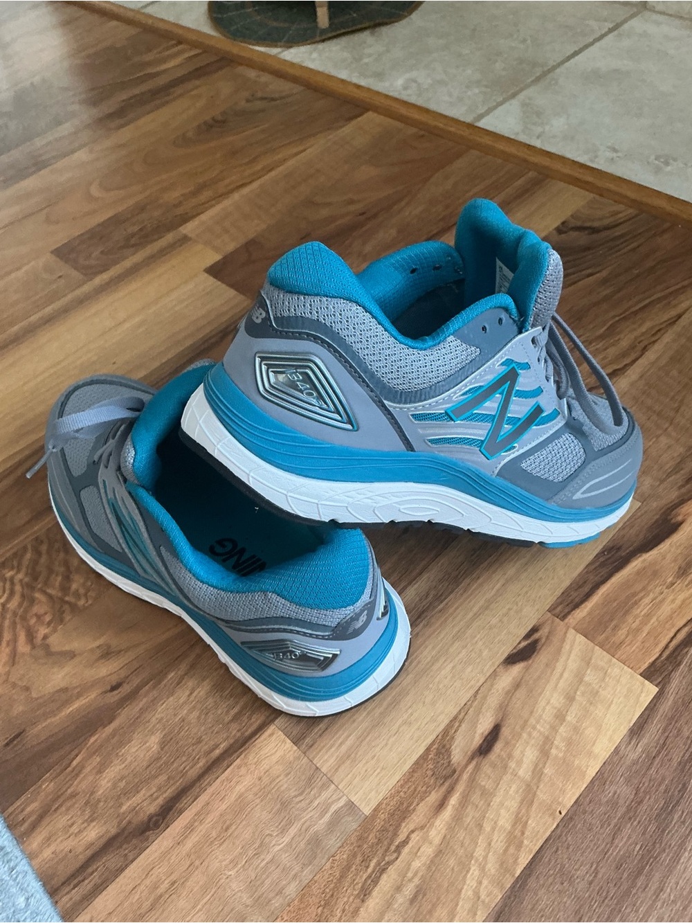 New Balance 1340 women’s Gray & Teal Athletic Sneakers